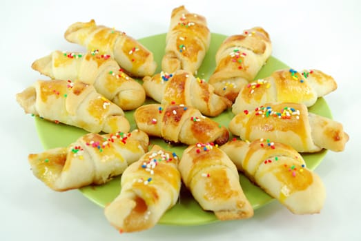 Crunchy brown sweet croissant on dish
