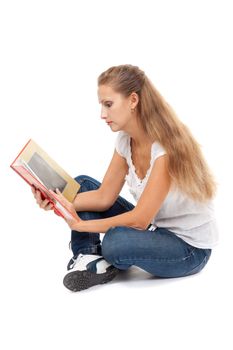 Beautiful girl in lotus position to read books. Isolate on white background.