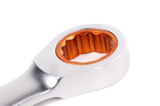Close up view of the automatic head of a ring spanner. Isolate on white. 
