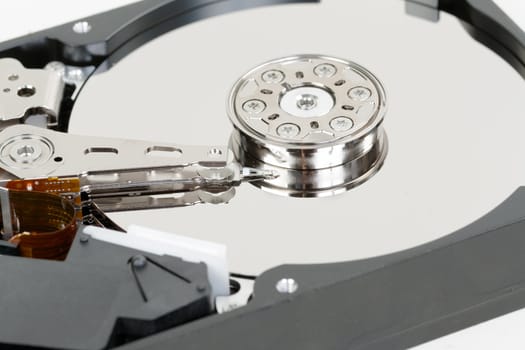 Opened hard disk drive. Internal hard disk structure.