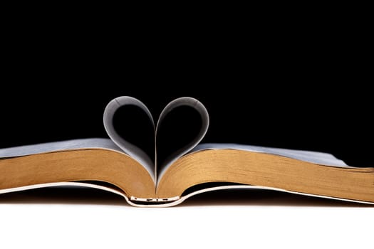 Book pages shaped as heart