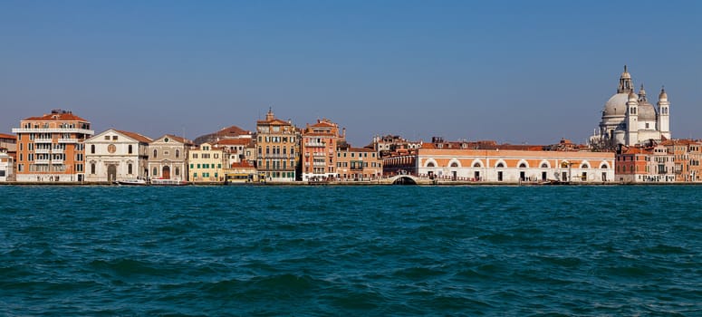 Specific image of traditional houses near the Grand Canal in Venice, Italy.