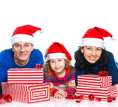 Portrait of friendly family in Santa's hat with gift box, isolated on white