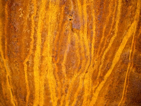 Rust streaked tin in orange and yellow