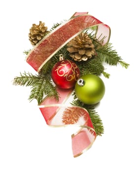 Christmas Ornaments, Golden Pine Cones, Red Ribbon and Pine Branches Isolated on a White Background.