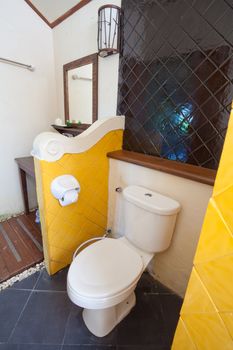 vintage old bathroom with brick wall in resort