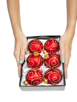 female woman hand holding Christmas ball