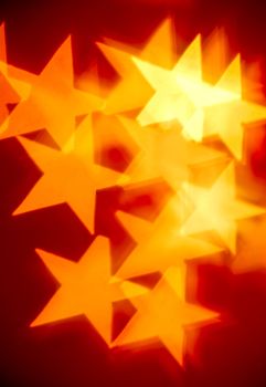 Blurred star shaped Christmas lights background