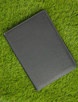 book on artificial green grass