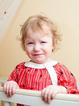 Portrait of sad little girl with tear in her eye