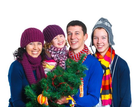 Portrait of friendly family in winter hat with christmas tree, isolated on white