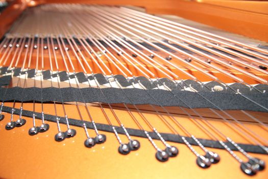 inside the piano: string, pins and hammers