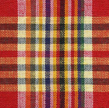 Red and yellow square fabric pattern background 