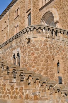 detailed stone wall with stairs of old medieval church in Barcelona