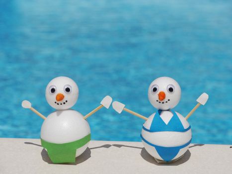 snowman beach vacation holidays from cold winter