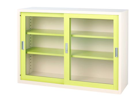 Beautiful bright green empty cabinet with transparent mirror doors