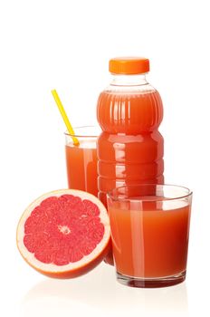 Grapefruit juice in plastic bottle and grapefruit fruits on white background