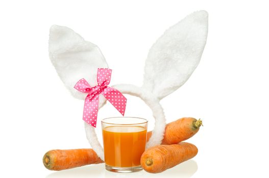 Fresh carrot juice with bunny ears isolated on white background