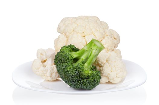 Fresh ripe broccoli piece and cauliflower cabbage on plate on white background