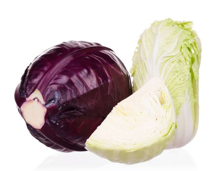 Fresh green, red, and Chinese cabbage vegetables on white background