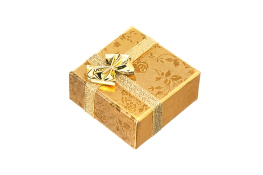 Golden gift box with ribbon and bow on white background