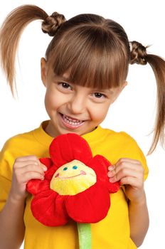 Portrait of happy little girl with flower isolated on white background