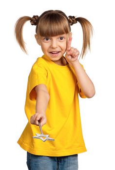 Portrait of happy little girl with magic wand isolated on white background