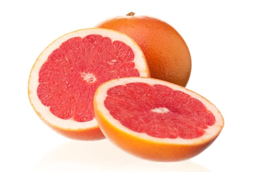 Fresh ripe half grapefruit on white background