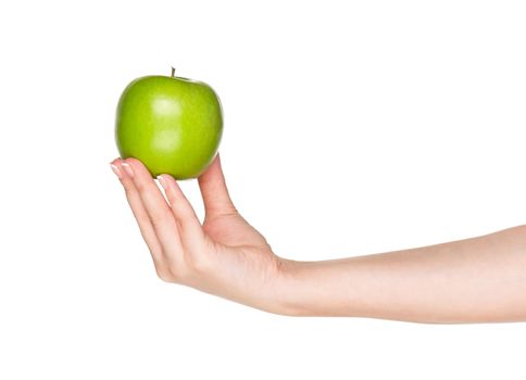 Woman hand with green apple isolated on white background