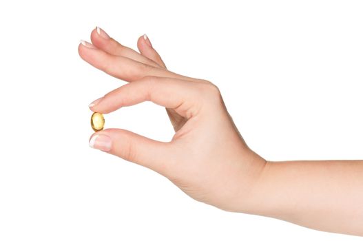 Pills in woman hand isolated on white background