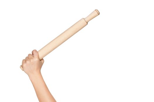 Woman hand with wooden rolling pin isolated on white background