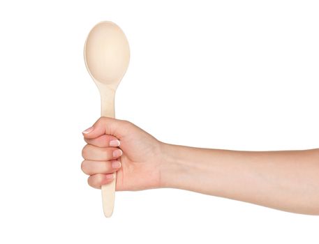 Woman hand with wooden spoon isolated on white background