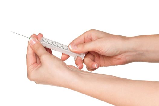 Woman hands with syringe isolated on white background