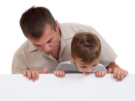 Portrait of happy dad and son with empty white board isolated on white background