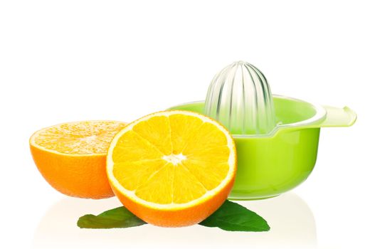 Plastic juicer for citrus with orange fruits on white background