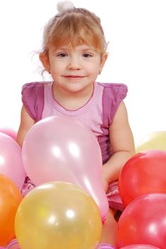 Little girl with balloons studio shot