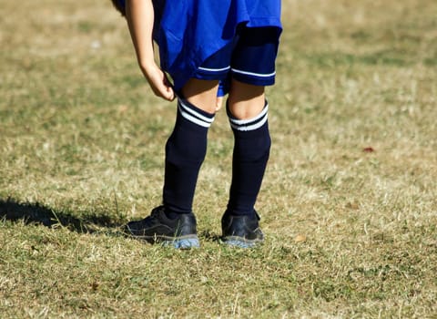 Child football player, implementation of its socks