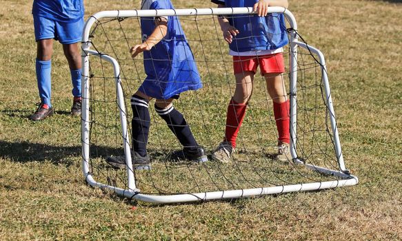 young football players, goalkeepers