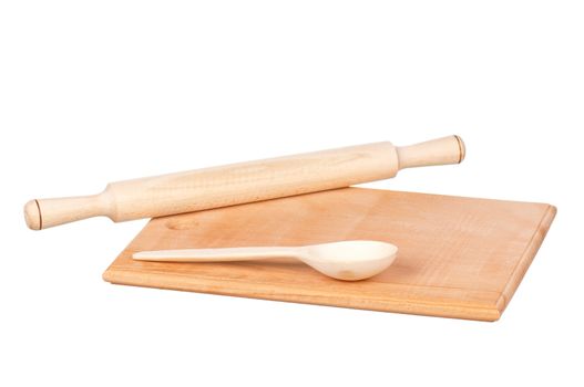 Wooden hardboard with rolling pin and spoon isolated on white background