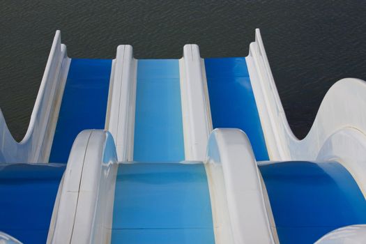 The blues of a water chute at a lakeside resort in SW France