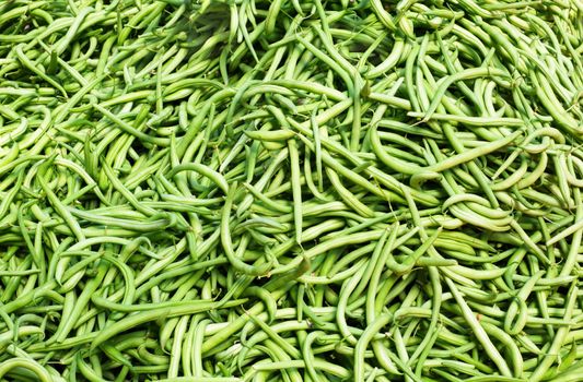Big pile of Green string Beans at the farmers market