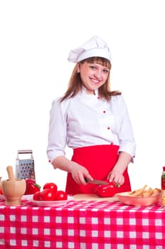 attractive woman cuts vegetables, cooking dinner, isolated on white