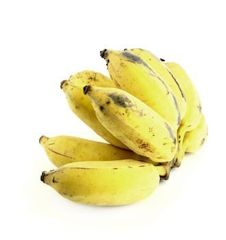 bunch of over ripe bananas on white background