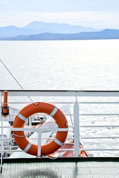 Life buoy with beacon on a ship