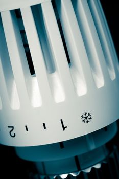 Thermostatic radiator valve set to minimal temperature close-up