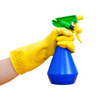 Hand in yellow protective glove holding blue spray bottle on white background