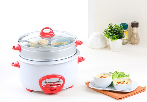 Electric steaming and casserole pot a useful kitchenware