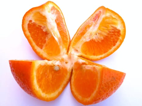 Image of sliced juicy orange isolated on white background