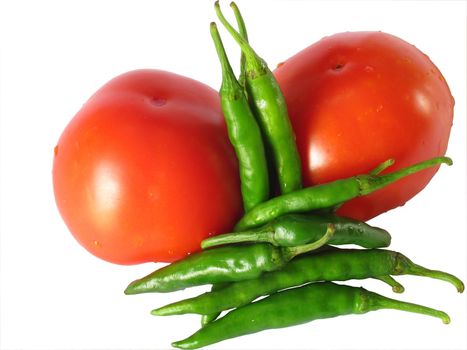 Image of tomato and green chillies isolated on the white background