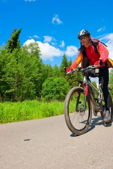 Traveling cyclists on country road